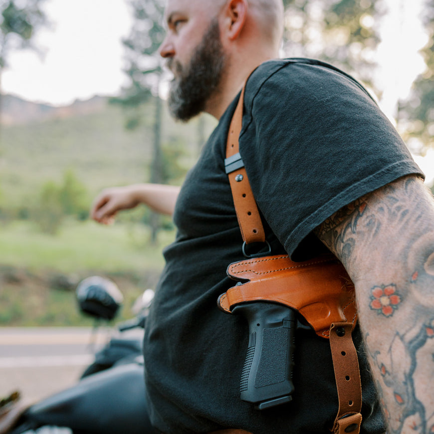 man wearing shoulder holster